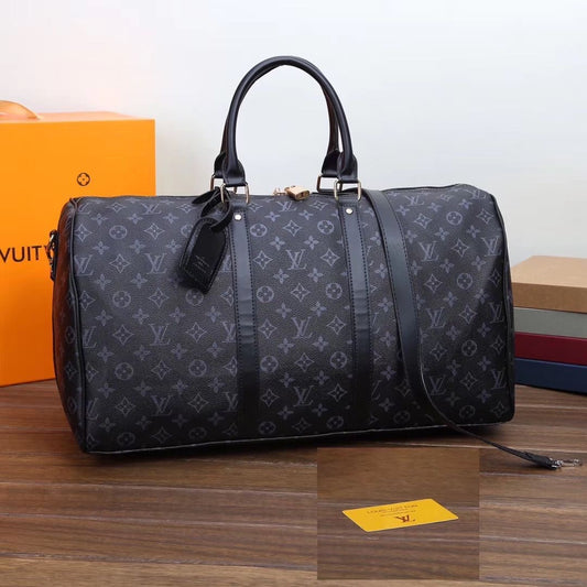 Black monogram holdall bag