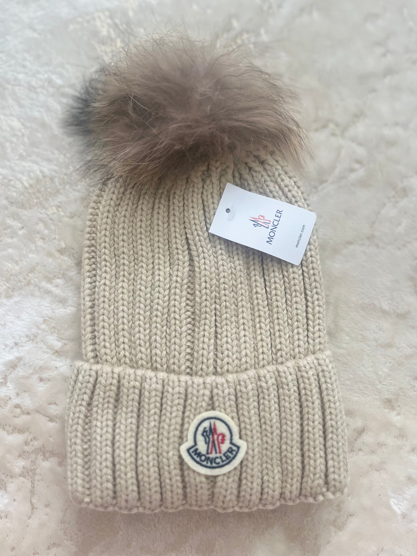 beige mon bobble hat